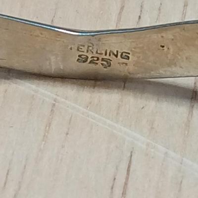 .925 marked dangle earrings and a sterling marked bracelet