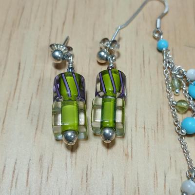 .925 marked dangle earrings and a sterling marked bracelet