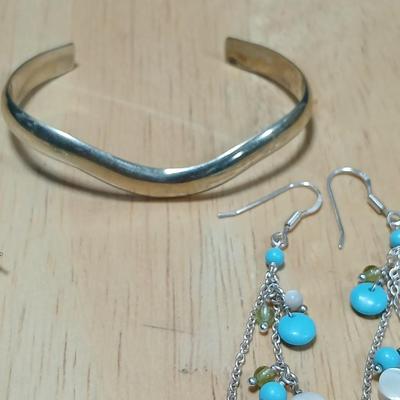 .925 marked dangle earrings and a sterling marked bracelet