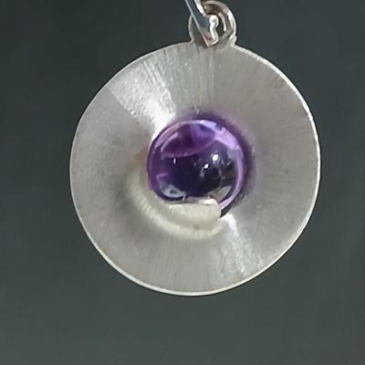 Vintage signed earrings marked .925 with purple centers