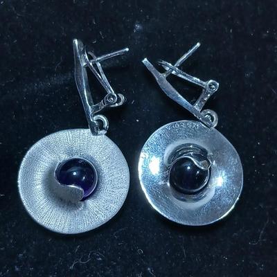 Vintage signed earrings marked .925 with purple centers