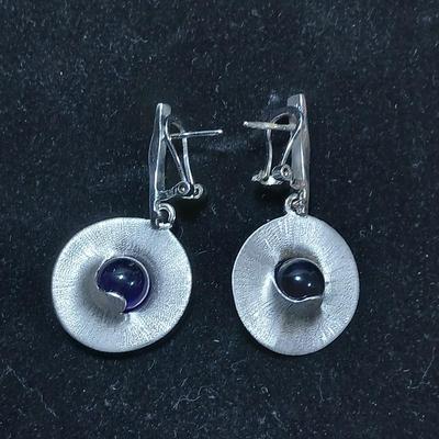 Vintage signed earrings marked .925 with purple centers