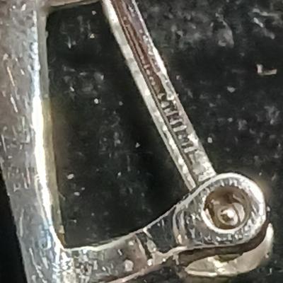 Vintage signed earrings marked .925 with purple centers