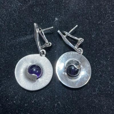 Vintage signed earrings marked .925 with purple centers