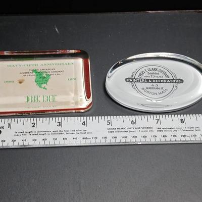 Two vintage advertisement paperweights - Cyris T. Clark Company Boston Mass. & North American Accident Insurance company 1951