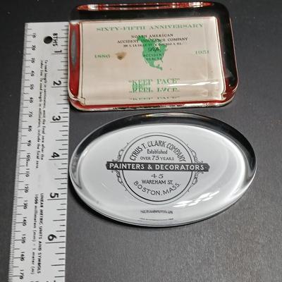 Two vintage advertisement paperweights - Cyris T. Clark Company Boston Mass. & North American Accident Insurance company 1951