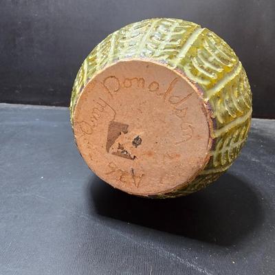 Small Green toned pottery Vases - one signed on base