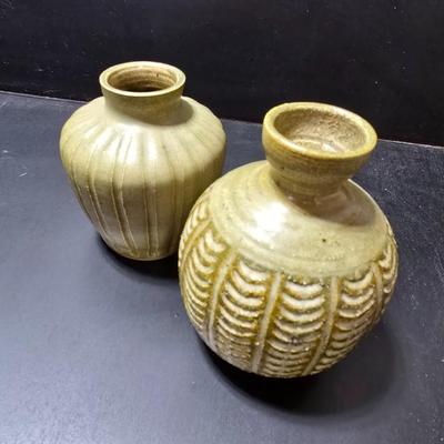 Small Green toned pottery Vases - one signed on base