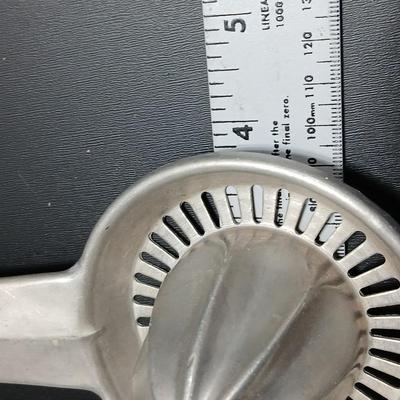 Two aluminum Juice reamers - Kwicky Juicer - Quam-Nichols Co.