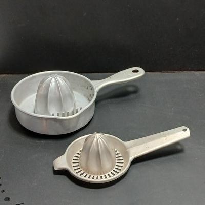 Two aluminum Juice reamers - Kwicky Juicer - Quam-Nichols Co.