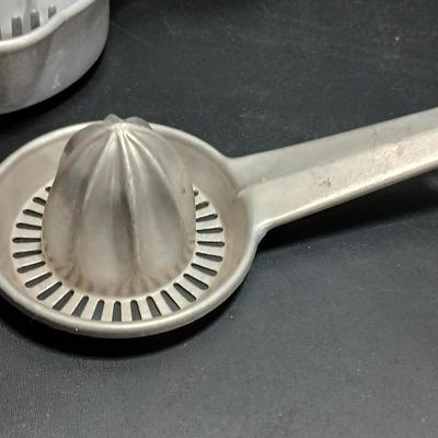 Two aluminum Juice reamers - Kwicky Juicer - Quam-Nichols Co.