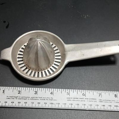 Two aluminum Juice reamers - Kwicky Juicer - Quam-Nichols Co.