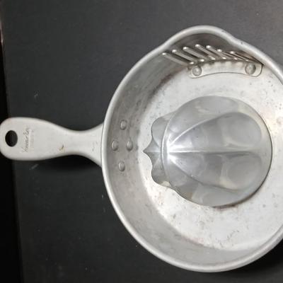 Two aluminum Juice reamers - Kwicky Juicer - Quam-Nichols Co.