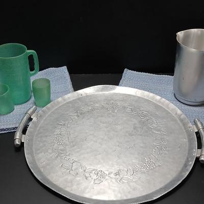 Vintage Hand Forged Hammered Aluminum Handled Fruit Design Serving Plate Tray Aluminum pitcher and vintage plastic pitcher with two small...