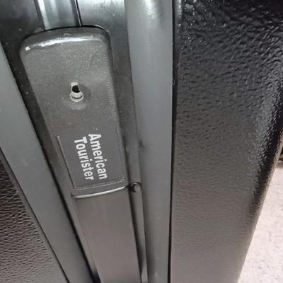 HARD SIDED AMERICAN TOURISTER SUITCASE ON 2 WHEELS AND 2 LAKORUS SOFT BAGS