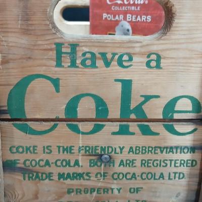 Vintage 1976 wooden Coca Cola crate with coca cola bottles, antique opener and a collectable book