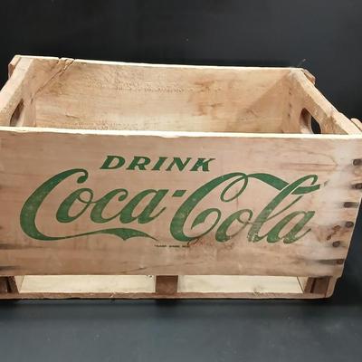 Vintage 1976 wooden Coca Cola crate with coca cola bottles, antique opener and a collectable book