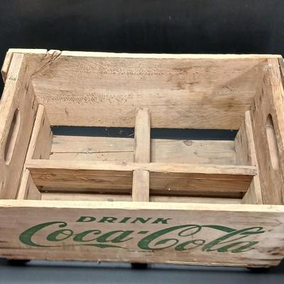 Vintage 1976 wooden Coca Cola crate with coca cola bottles, antique opener and a collectable book