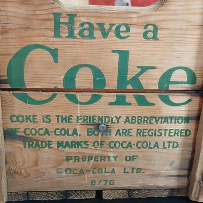 Vintage 1976 wooden Coca Cola crate with coca cola bottles, antique opener and a collectable book