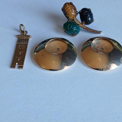 Assortment of 14k Marked Jewelry - 14k Big ben tower - 14k Fluted circle earrings - and a single gemstone earring