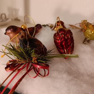 A VARIETY OF BIRD ORNAMENTS