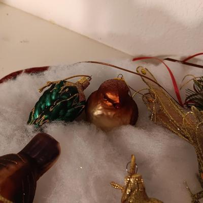 A VARIETY OF BIRD ORNAMENTS
