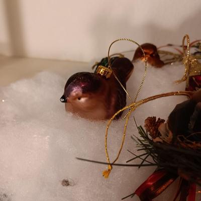 A VARIETY OF BIRD ORNAMENTS