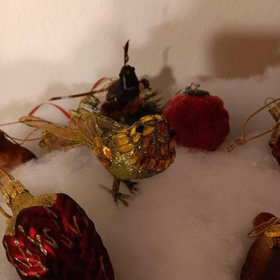 A VARIETY OF BIRD ORNAMENTS
