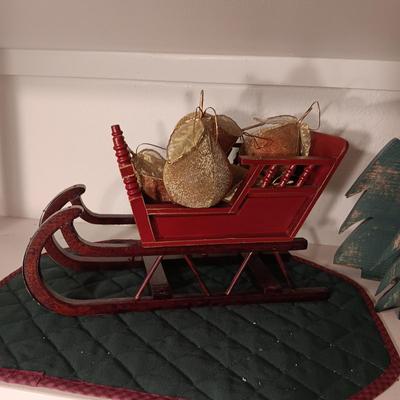WOODEN SLEIGH WITH SATIN LIKE PEAR ORNAMENTS AND WOODEN TREES