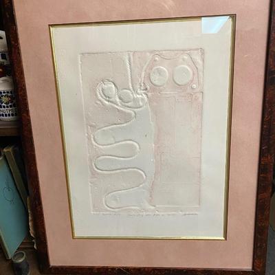 Signed and humbered embossed paper art