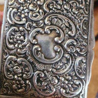 Silver business card holder $85
