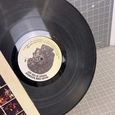 GRAND FUNK RAILROAD / CAUGHT IN THE ACT 