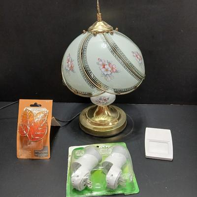 Small 14" glass globe porcelain and brass colored lamp with new air wick scented oil warmers, nightlight, and new Yankee candle...