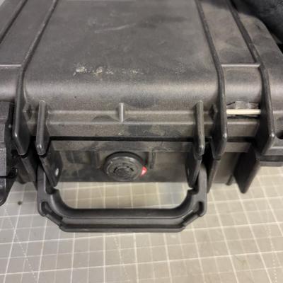Pelican Case with A broken Latch and a Lunch Bucket