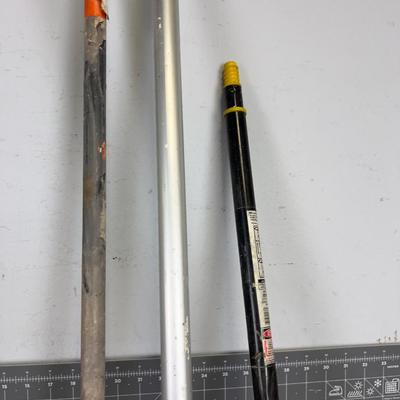 Mostly Adjustable Height Paint Sticks Wood and Aluminum. 