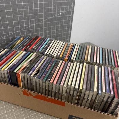 Tray full of CD's; Country and Rock