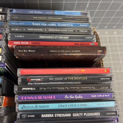 Tray full of CD's; Country and Rock