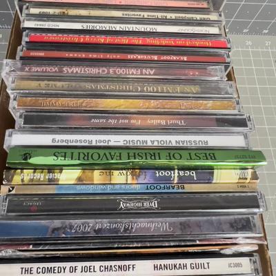 Tray full of CD's; Country, X-mas and Some Rock