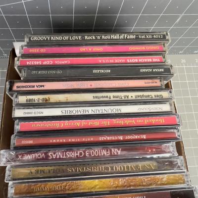 Tray full of CD's; Country, X-mas and Some Rock