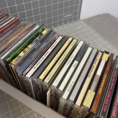 Tray full of CD's; Country, X-mas and Some Rock