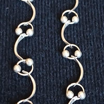 .925 Linked designer necklace and a "S" pendant on a chain