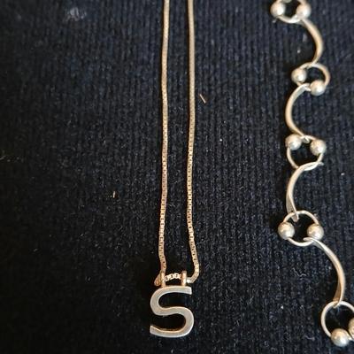.925 Linked designer necklace and a "S" pendant on a chain