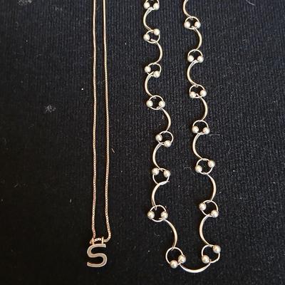 .925 Linked designer necklace and a "S" pendant on a chain