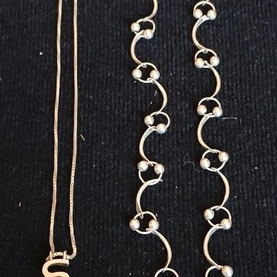 .925 Linked designer necklace and a "S" pendant on a chain