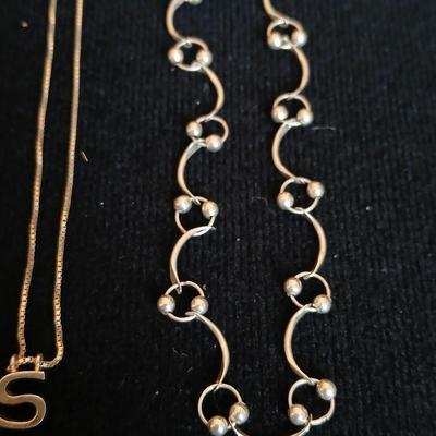 .925 Linked designer necklace and a "S" pendant on a chain