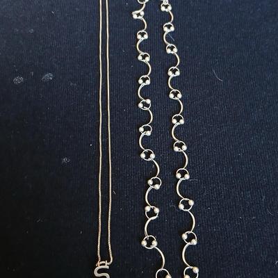 .925 Linked designer necklace and a "S" pendant on a chain