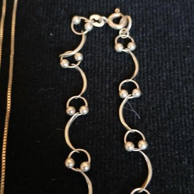 .925 Linked designer necklace and a "S" pendant on a chain