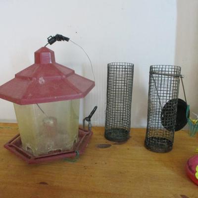 Assortment Of Bird Supplies Feeders