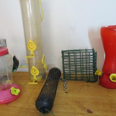 Assortment Of Bird Supplies Feeders