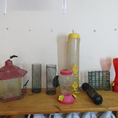 Assortment Of Bird Supplies Feeders